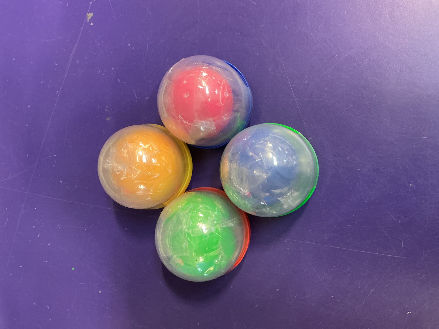 Color change squooshers in capsules