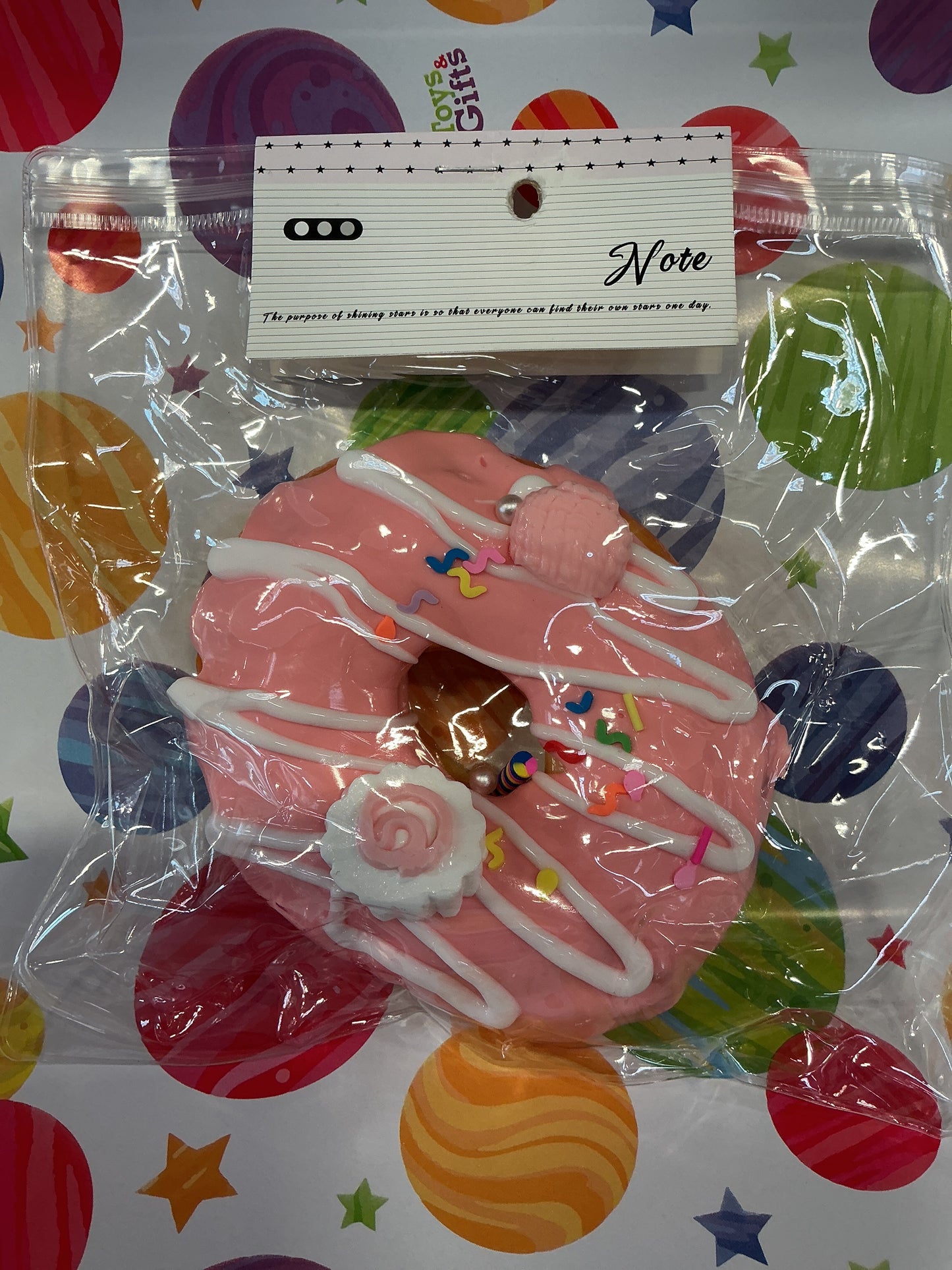 Pande Pink frosted fancy donut taba